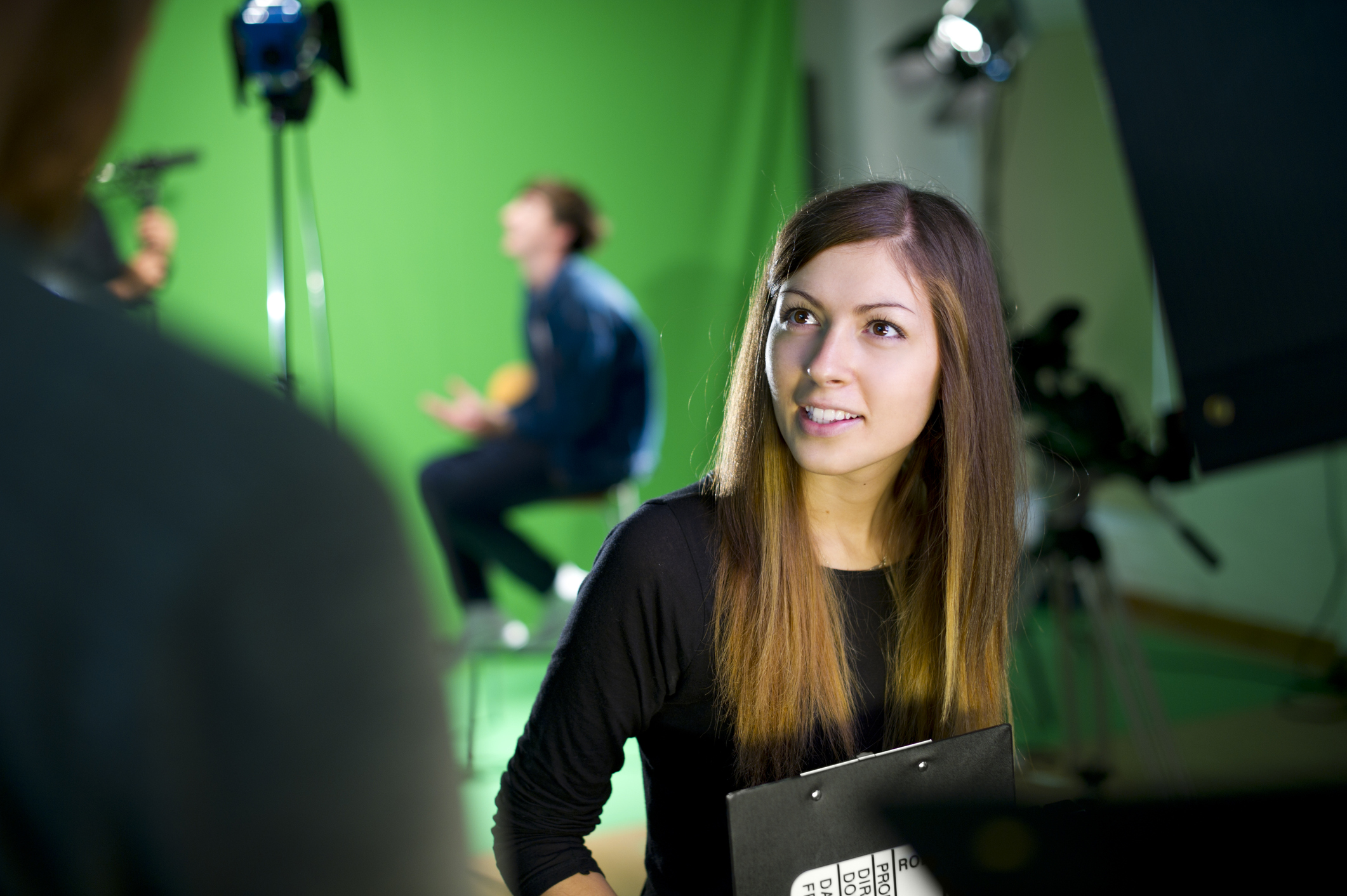 media student in college tv studio